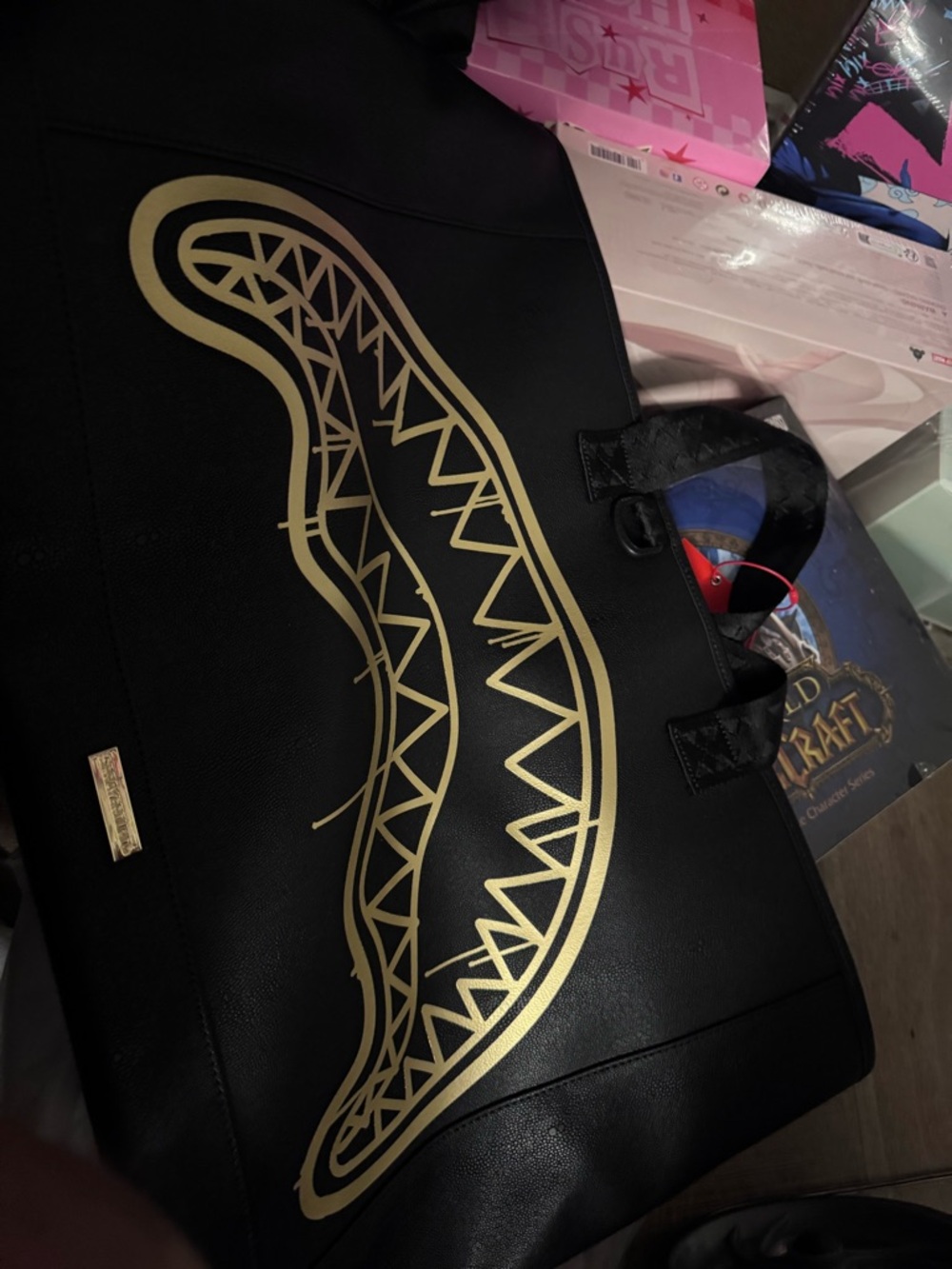 Sprayground Black Tote with Gold Shark Mouth Graphic